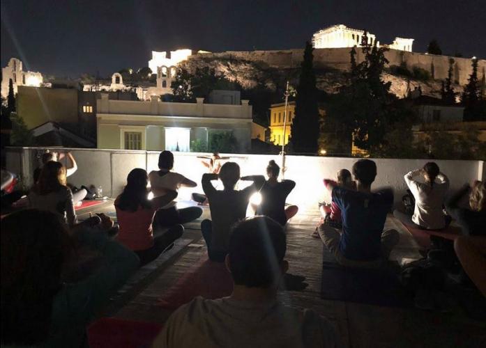 Night Yoga on the Acropolis Roof Deck